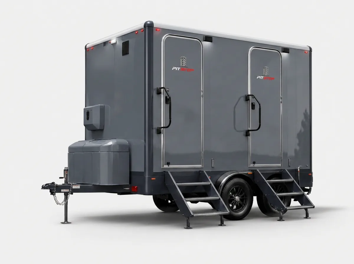 Multi-stall luxury restroom trailer with entry steps, photographed on a clean background
